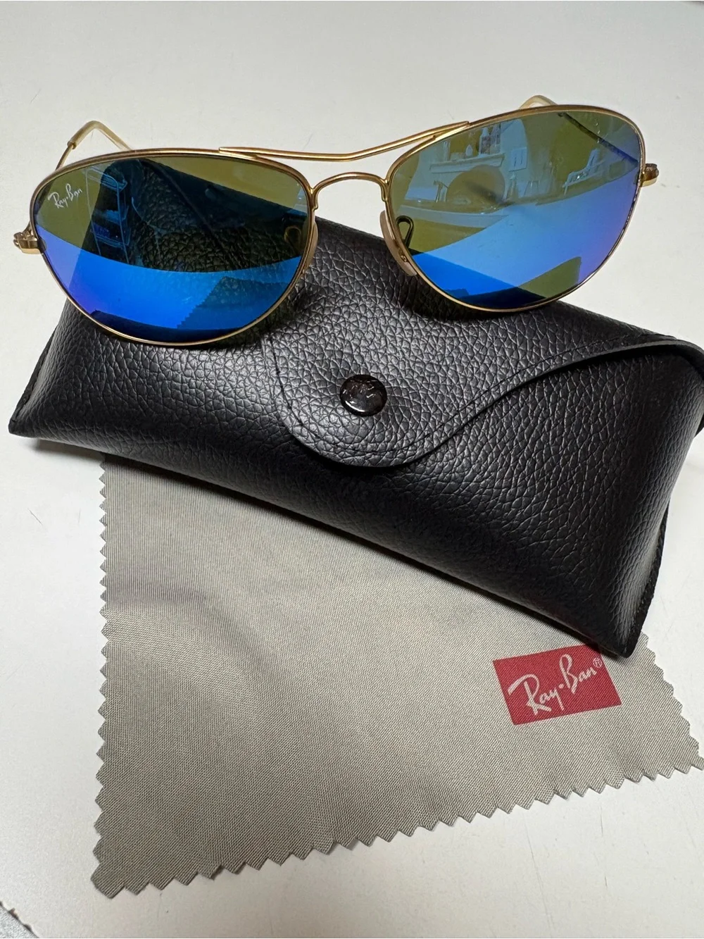Ray-Ban Gold Frame Sunglasses with Blue Mirrored Lenses